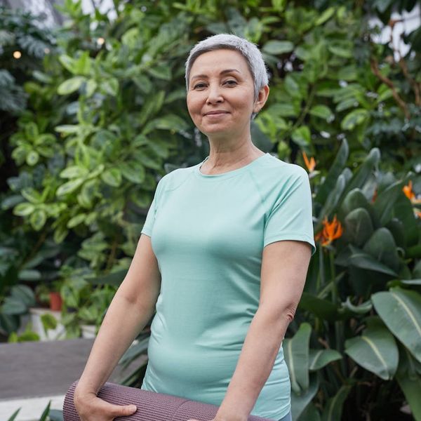 Portrait of a smiling woman looking calm and happy.